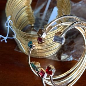 2 gold cuff bracelets